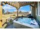 Backyard with pergola and hot tub for relaxation and enjoyment in the privacy of your own home at 1024 Jensen Grove Ct, Fuquay Varina, NC 27526