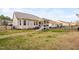 Well-maintained backyard with a privacy fence and a cozy porch, ideal for enjoying outdoor gatherings and relaxing in nature at 105 Olde Liberty Dr, Youngsville, NC 27596
