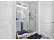 Modern bathroom featuring a glass-enclosed shower, white subway tile, and stylish fixtures at 105 Olde Liberty Dr, Youngsville, NC 27596