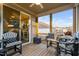 Relaxing screened porch featuring stylish seating and views of the backyard and neighborhood at 105 Olde Liberty Dr, Youngsville, NC 27596