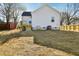 The backyard has a deck, and some trees at 109 Faucette Ave, Burlington, NC 27215