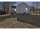 Spacious backyard featuring a lawn and privacy fence, ideal for outdoor activities and relaxation at 109 Faucette Ave, Burlington, NC 27215