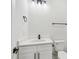 Modern bathroom featuring sleek vanity, white countertops, matte black hardware, and a toilet at 109 Faucette Ave, Burlington, NC 27215