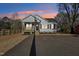 Charming single-story home featuring a welcoming front porch and well-maintained landscaping at 109 Faucette Ave, Burlington, NC 27215