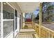 View from the covered front porch, perfect for enjoying peaceful outdoor moments at 109 Faucette Ave, Burlington, NC 27215