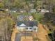 Aerial view of new construction home in established neighborhood at 111 Faucette Ave, Burlington, NC 27215