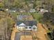 Charming home featuring a lovely front porch and construction in a wooded neighborhood at 111 Faucette Ave, Burlington, NC 27215