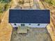 Aerial view showing home and new deck, plus straw-covered lawn and nice roof at 111 Faucette Ave, Burlington, NC 27215