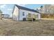 Back of home with deck and access to the backyard at 111 Faucette Ave, Burlington, NC 27215