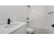 Bathroom featuring a combination shower-tub and a sink at 111 Faucette Ave, Burlington, NC 27215