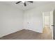 Well lit bedroom featuring wood-look floors and bright, neutral colored walls at 111 Faucette Ave, Burlington, NC 27215