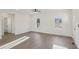 Bright living room features modern flooring, recessed lighting, and fresh neutral paint at 111 Faucette Ave, Burlington, NC 27215