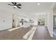 Open concept living space connects the kitchen, dining, and living areas seamlessly at 111 Faucette Ave, Burlington, NC 27215