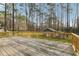 Wood deck featuring a railing and view to a backyard shed at 1113 Harvest Mill Ct, Raleigh, NC 27610