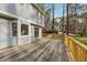 Wide backyard deck overlooks the landscaped yard at 1113 Harvest Mill Ct, Raleigh, NC 27610