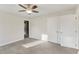 Bedroom with neutral carpet, closet, and views to other rooms at 1113 Harvest Mill Ct, Raleigh, NC 27610