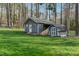 Backyard shed offers extra storage and utility with a well-maintained exterior at 1113 Harvest Mill Ct, Raleigh, NC 27610