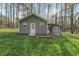 Backyard shed offers extra storage and utility with a well-maintained exterior at 1113 Harvest Mill Ct, Raleigh, NC 27610
