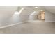 This spacious bonus room features carpet flooring and two skylights for plenty of natural light at 116 Galway Dr, Chapel Hill, NC 27517