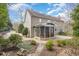 Home exterior with manicured landscaping and a screened in porch for outdoor enjoyment at 116 Galway Dr, Chapel Hill, NC 27517