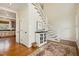 Grand foyer with high ceilings, hardwood floors, and staircase leading to the upper level at 116 Galway Dr, Chapel Hill, NC 27517