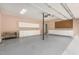 Spacious three-car garage featuring built-in shelving and ample storage space at 116 Galway Dr, Chapel Hill, NC 27517