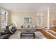 Bright and airy living room featuring large windows, neutral decor, and comfortable seating at 116 Galway Dr, Chapel Hill, NC 27517