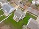 Beautiful home featuring a well-maintained lawn, cozy patio, and inviting outdoor space at 117 Talley Ridge Dr, Holly Springs, NC 27540