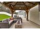 Relaxing outdoor patio space with comfortable seating and cozy fire pit; perfect for entertaining at 117 Talley Ridge Dr, Holly Springs, NC 27540