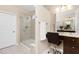 Bright bathroom showcasing a glass-enclosed shower and a makeup vanity area at 1214 Gaston Manor Dr, Durham, NC 27703