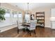 Cozy dining area featuring a round table, stylish chairs, and natural light at 1214 Gaston Manor Dr, Durham, NC 27703