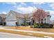 Lovely single-story home featuring a two-car garage and beautiful landscaping at 1214 Gaston Manor Dr, Durham, NC 27703