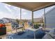 Relaxing screened porch with comfortable seating and views of the backyard at 1214 Gaston Manor Dr, Durham, NC 27703