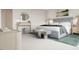 Serene bedroom with a gray bed, accent furniture, and a calming atmosphere at 1244 Hardin Hill Ln, Knightdale, NC 27545