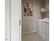 Functional laundry room featuring modern washer, dryer, and storage space at 1244 Hardin Hill Ln, Knightdale, NC 27545
