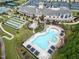 Stunning aerial view of community clubhouse with pool, tennis, bocce ball, and ample parking at 1407 Palmer Hill Dr, Durham, NC 27703