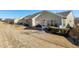 Beautiful backyard with a patio, green grass, and well-maintained landscaping at 1407 Palmer Hill Dr, Durham, NC 27703