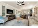 Open-concept floor plan with a spacious living room leading into the dining area and kitchen at 1407 Palmer Hill Dr, Durham, NC 27703