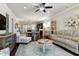 Open-concept living space with a living room, dining area, and kitchen is great for entertaining at 1407 Palmer Hill Dr, Durham, NC 27703