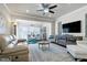 Cozy living room with a ceiling fan, a large area rug, and comfortable seating at 1407 Palmer Hill Dr, Durham, NC 27703