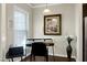 Comfortable office nook with a desk, chair, and printer, nestled near a bright window at 1407 Palmer Hill Dr, Durham, NC 27703