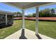 Scenic view from a covered patio overlooking the expansive backyard and surrounding landscape at 1511 Malcus Ct # 64, Fuquay Varina, NC 27526
