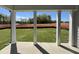 Covered patio overlooking a spacious backyard, offering outdoor living and entertaining space at 1511 Malcus Ct # 64, Fuquay Varina, NC 27526