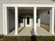 Covered patio with large columns, offering a relaxed outdoor space at 1511 Malcus Ct # 64, Fuquay Varina, NC 27526