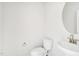 Bathroom featuring a toilet, sink and mirror at 153 Klamath Dr, Garner, NC 27529