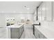 Well-lit kitchen featuring a kitchen island and modern appliances at 153 Klamath Dr, Garner, NC 27529