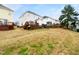 Backyard showing home exteriors and grassy area at 2013 Turtle Point Dr, Raleigh, NC 27604
