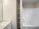 Bathroom features tub/shower, vanity and built-in shelving at 2013 Turtle Point Dr, Raleigh, NC 27604