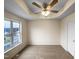 Bedroom featuring a large window and neutral colored walls at 2013 Turtle Point Dr, Raleigh, NC 27604