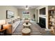 Staged living room showcasing neutral colors, fireplace, and sliding glass doors at 2013 Turtle Point Dr, Raleigh, NC 27604
